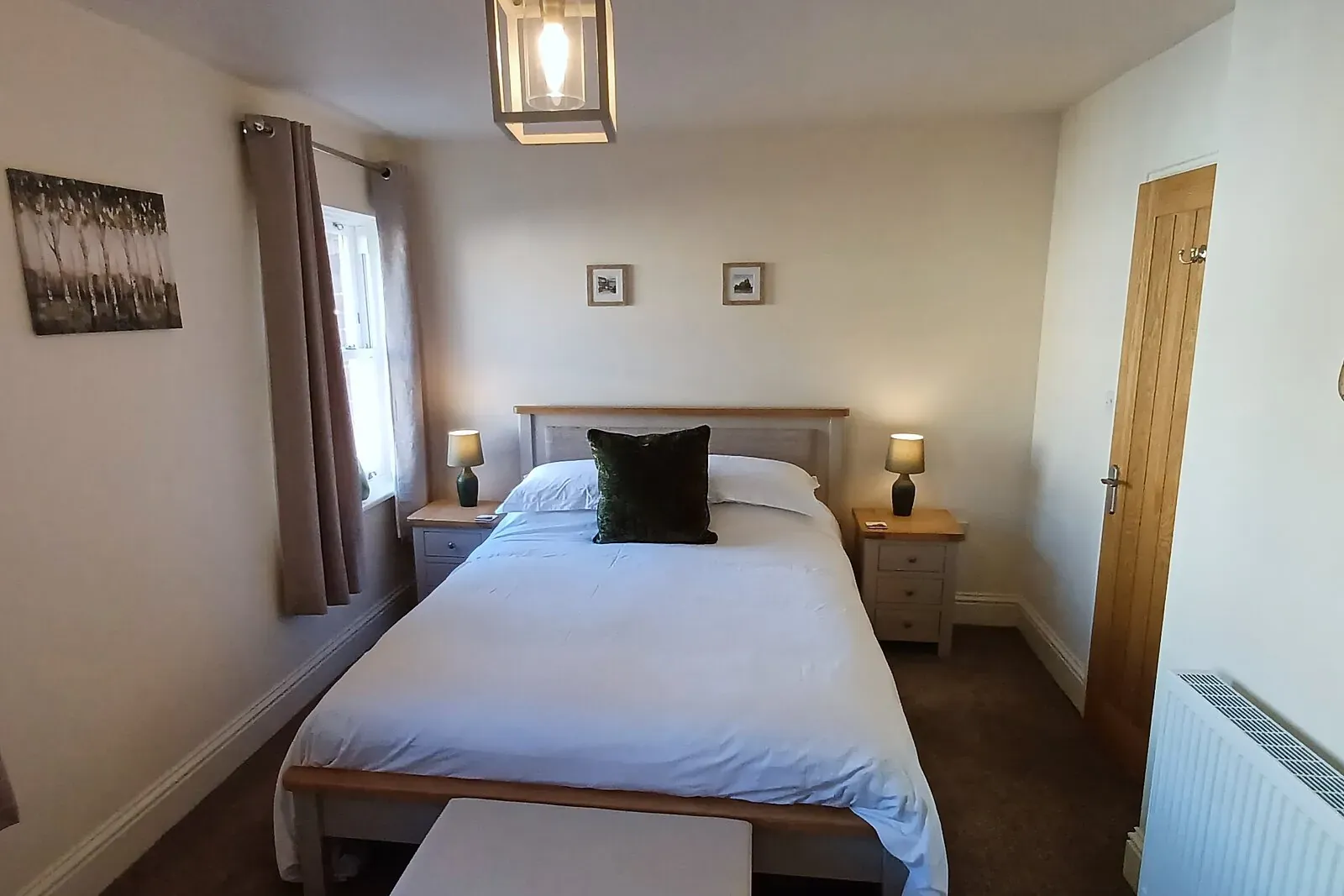 Master bedroom with kingsize bed